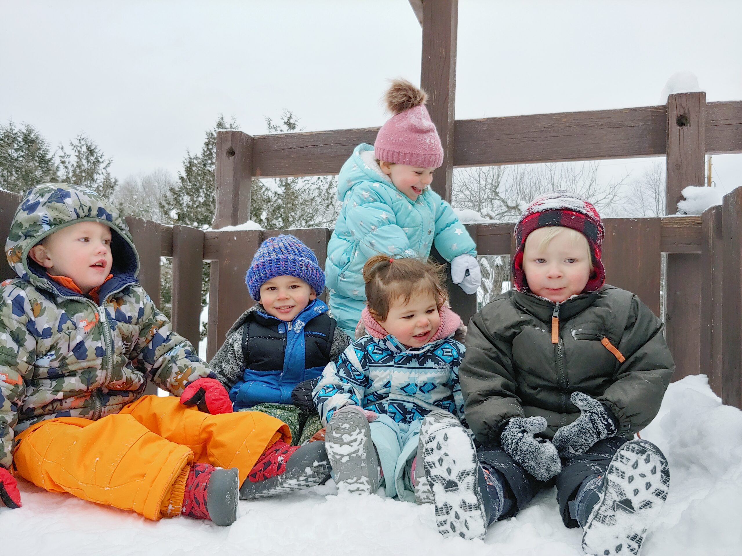 Kidcare Daycare children playing in the snow