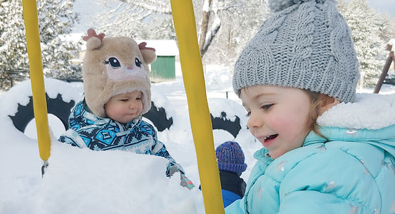 Kidcare Daycare playing in the snow.